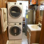 Half-bath with laundry facilities